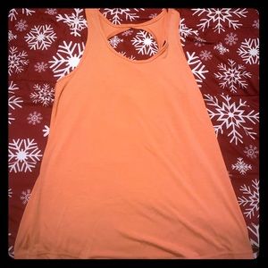 ZYIA Twist Back Tank in Flamingo.